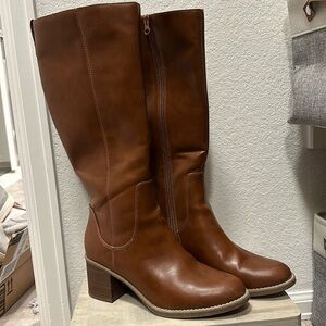 Knee high brown heeled boots